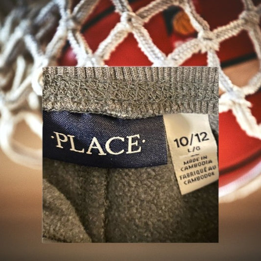 Looking to dominate the court, experience unbeatable comfort and performance with these PLACE sweatpants