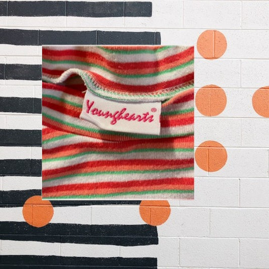 Made by Younghearts, a trusted brand in children's fashion, this top is not only stylish, but also durable and comfortable for your little one