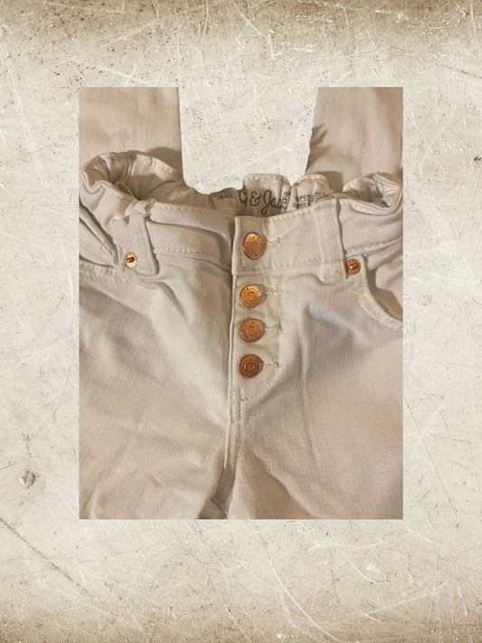 Boost your little one's style and comfort with our Cat & Jack White skinny jeans