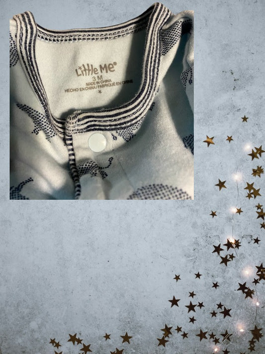 This Little Me Footed Animal Cotton Onesie features a charming powder blue design with animal motifs