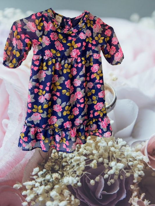 Route 66 floral ruffle dress with vibrant floral designs and elegant ruffled sleeves