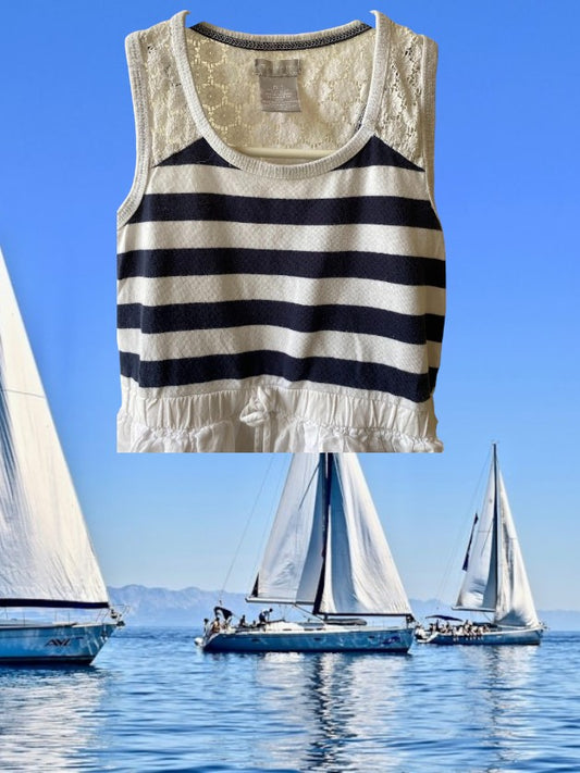 This Tahari's girl's dress boasts a stylish stripe design and a charming ruffle and floral bottom