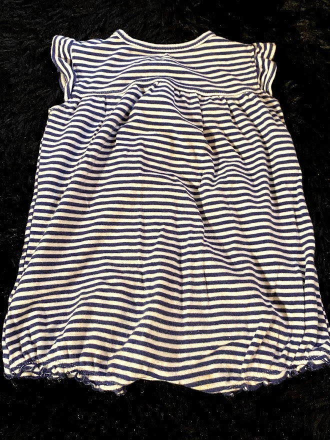 This adorable Carter's Girl Stripe Applique Floral Onesie combines comfort and charm
