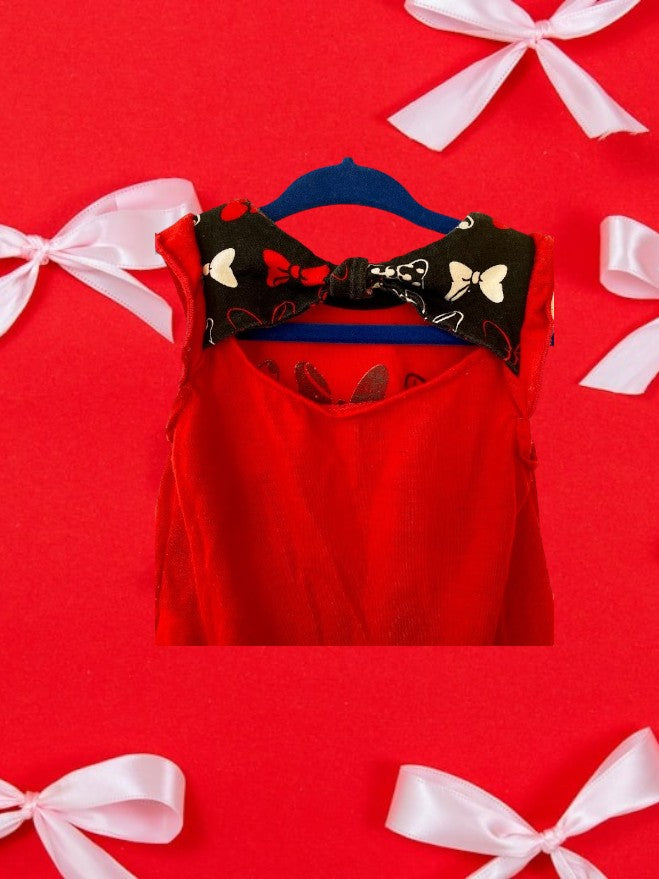 Sparkle and shine with our Disney Minnie Bows Glitter Top for your little fashionista