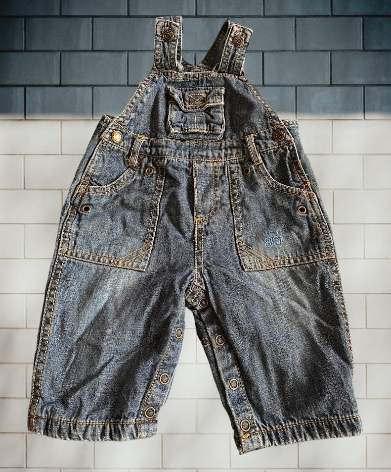 The Children's Place distressed jean overalls are designed to keep your baby boy comfortable and stylish