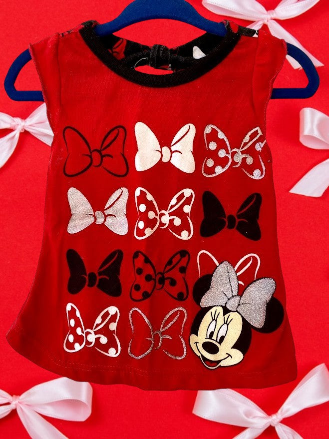 Sparkle and shine with our Disney Minnie Bows Glitter Top for your little fashionista