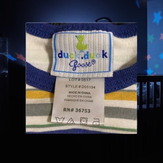 Dress up your baby in style with this high-quality Duck Duck Goose cotton onesie featuring a colorful stripe and cute giraffe appliqué design