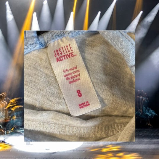 The Justice Glitter Dancer Graphic Tee is perfect for any young girl looking to add some extra sparkle to her wardrobe