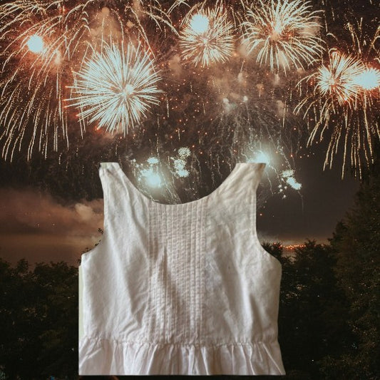 This beautiful Shrinking Violet cotton dress boasts a crocheted design