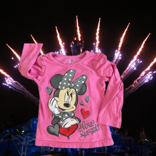 Celebrate your little one’s love for Disney with the “How Sweet” Minnie Cotton Glitter Graphic Tee