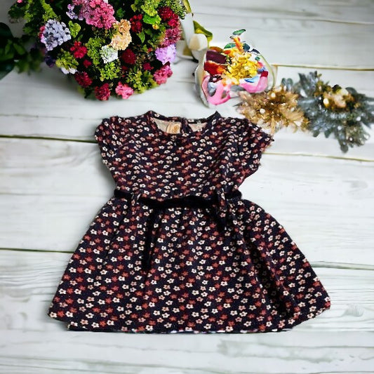 Pretty little girl's beautiful all-over floral dress