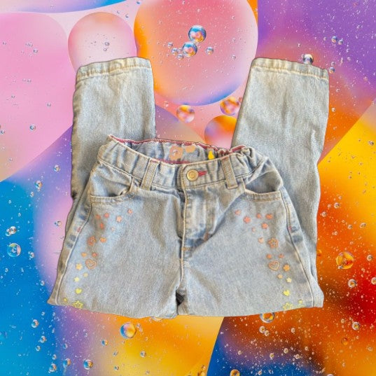 Featuring a unique appliqué design of glitter hearts and stars, these Healthtex jeans are very pretty and fashionable