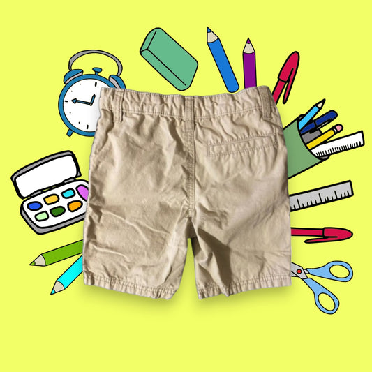 These boy's khaki cotton shorts are both stylish and trendy