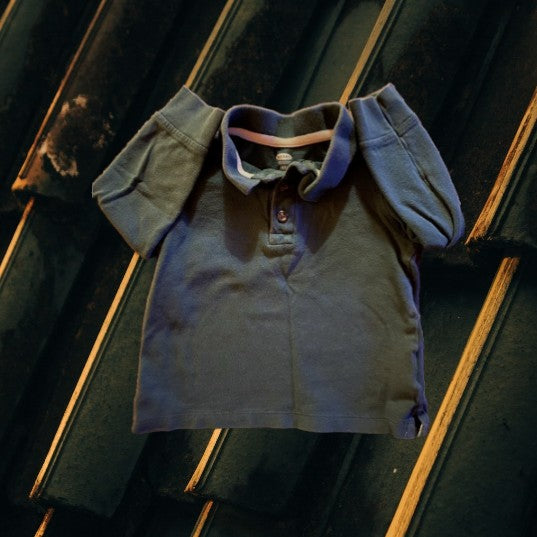 This comfortable cotton shirt from Old Navy features a classic collar and convenient pull over design