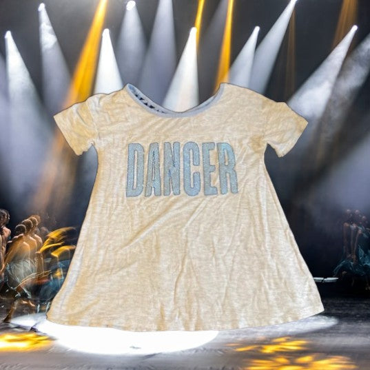 The Justice Glitter Dancer Graphic Tee is perfect for any young girl looking to add some extra sparkle to her wardrobe