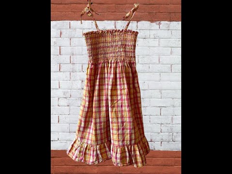 Add a little sparkle and shine to your summer wardrobe with the N.Y.C. girl's cotton tube top dress