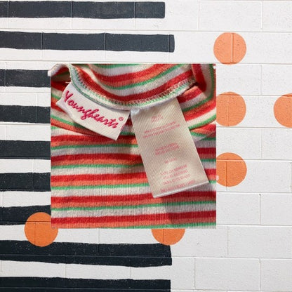 Made by Younghearts, a trusted brand in children's fashion, this top is not only stylish, but also durable and comfortable for your little one