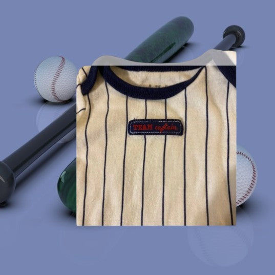 This Carter's newborn onesie features a bold team captain design, making it perfect for sports-loving families