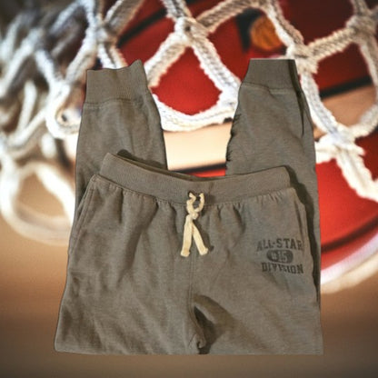 Looking to dominate the court, experience unbeatable comfort and performance with these PLACE sweatpants