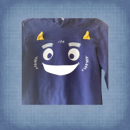 Keep your toddler warm all day long with this Carter's hoodie monster design cotton sweatshirt
