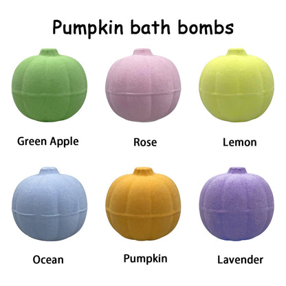 Six pumpkin-shaped bath bombs in different colors with labels on a white background