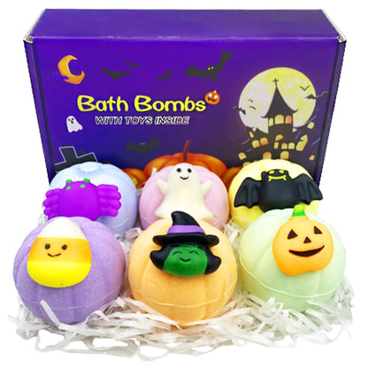 Halloween-themed bath bombs with toys inside, displayed in front of a purple box with Halloween graphics.