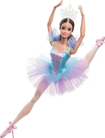 This collectible Barbie doll comes in a stunning satiny ballerina costume, complete with a multi-layered tulle tutu skirt