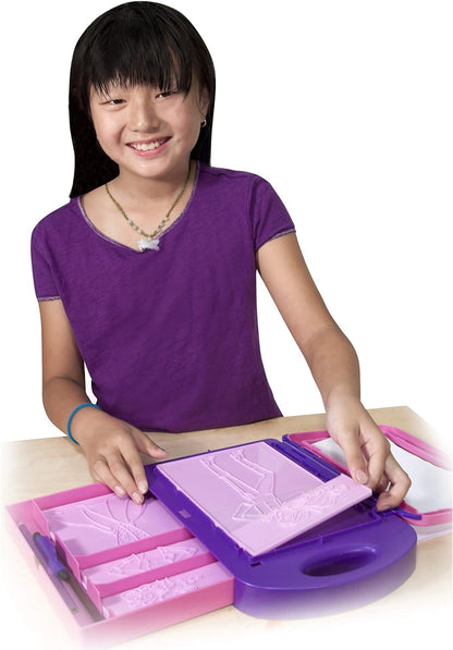 The Melissa & Doug fashion design kit includes everything needed for simple and fun fashion plate rubbings