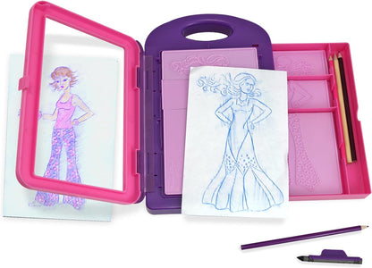 The Melissa & Doug fashion design kit includes everything needed for simple and fun fashion plate rubbings