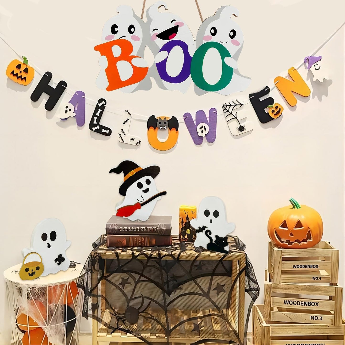 Enhance your Halloween decorations with this BOO wooden ghost sign set