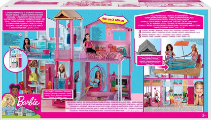 This Barbie doll townhouse boasts three levels of play space and fun