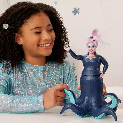 Disney’s The Little Mermaid Ursula fashion posable doll comes with realistic tentacles, a removable necklace, and sparkling details that add to its charm