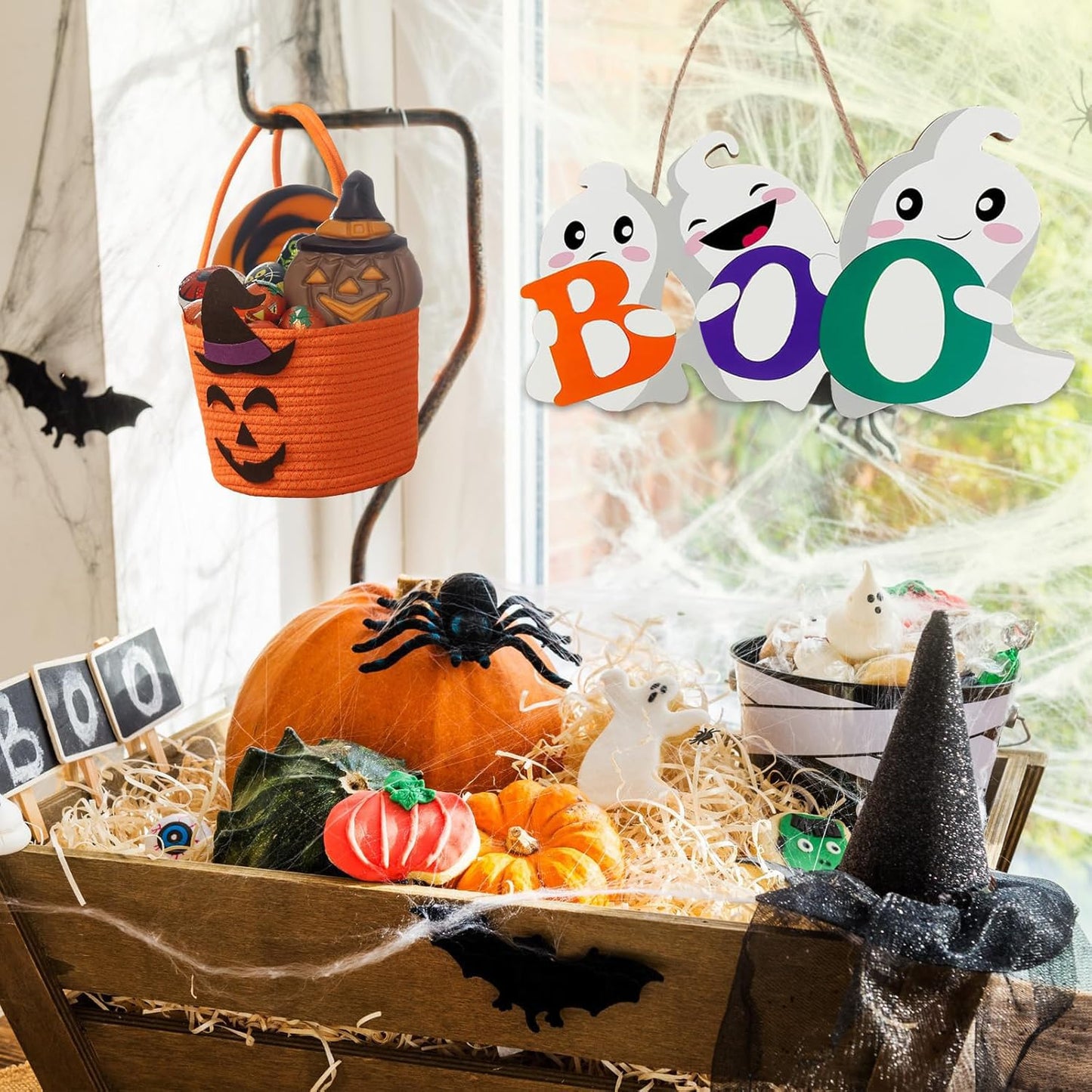 Enhance your Halloween decorations with this BOO wooden ghost sign set