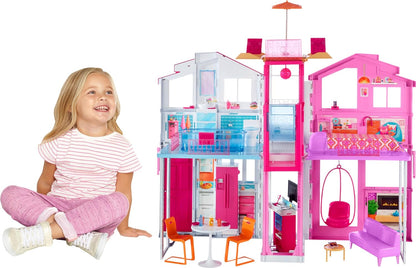This Barbie doll townhouse boasts three levels of play space and fun