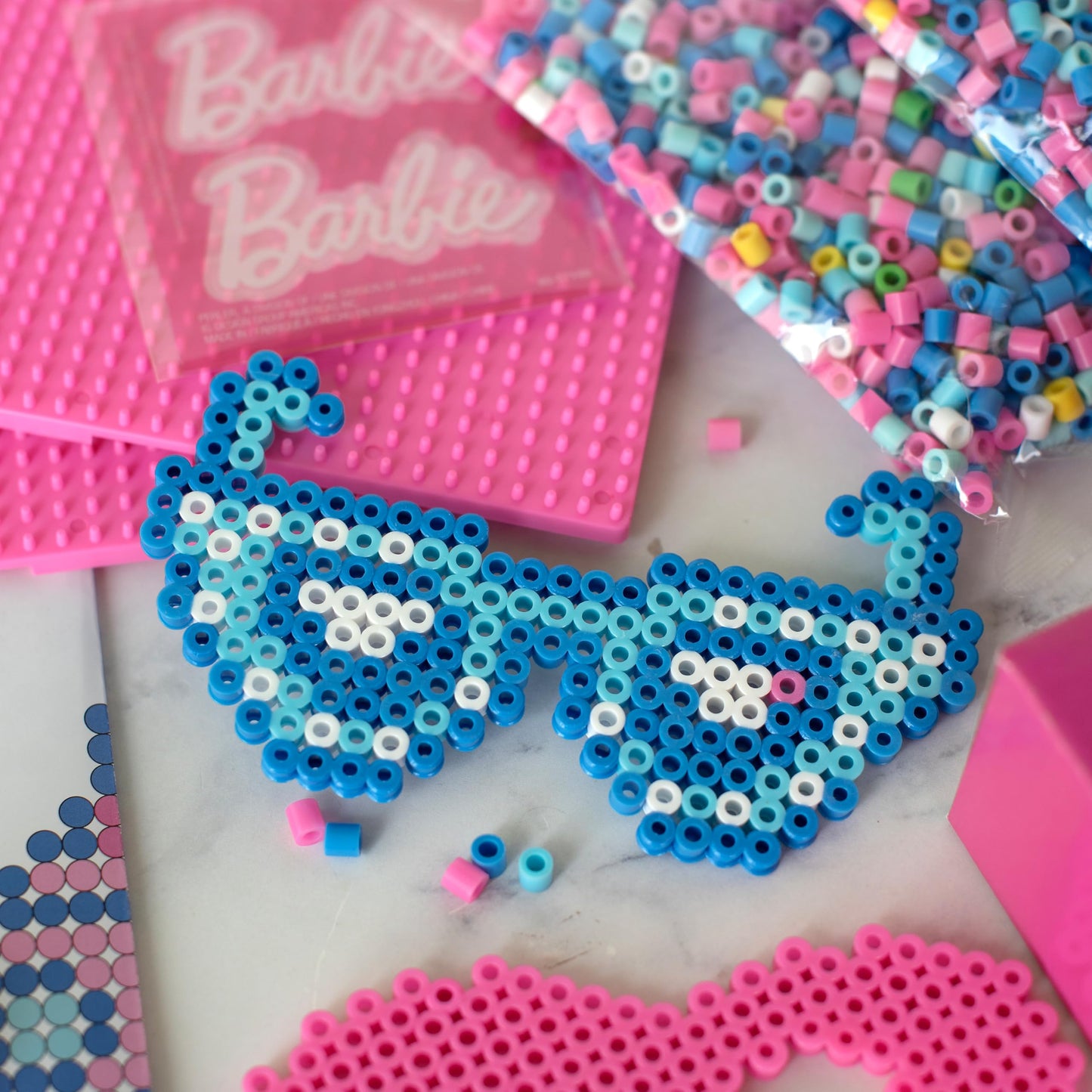 Create iconic Barbie designs with this deluxe fuse bead activity kit from Perler