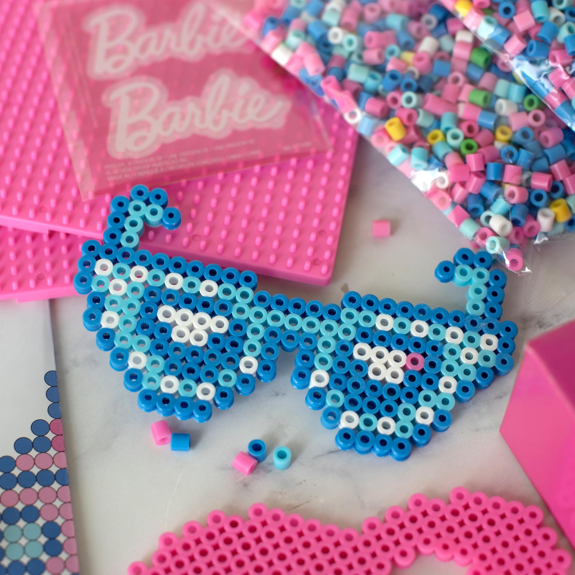 Create iconic Barbie designs with this deluxe fuse bead activity kit from Perler