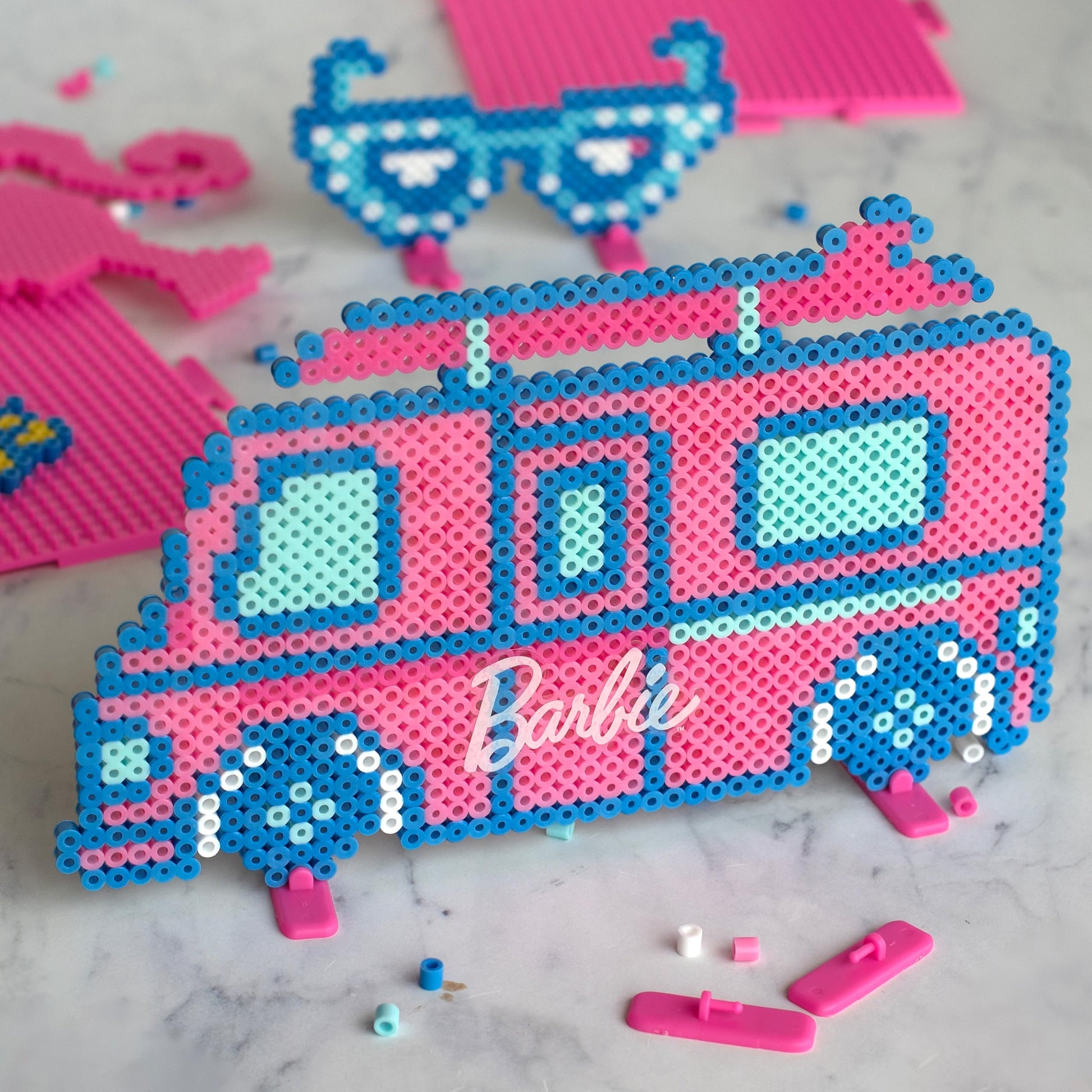 Create iconic Barbie designs with this deluxe fuse bead activity kit from Perler