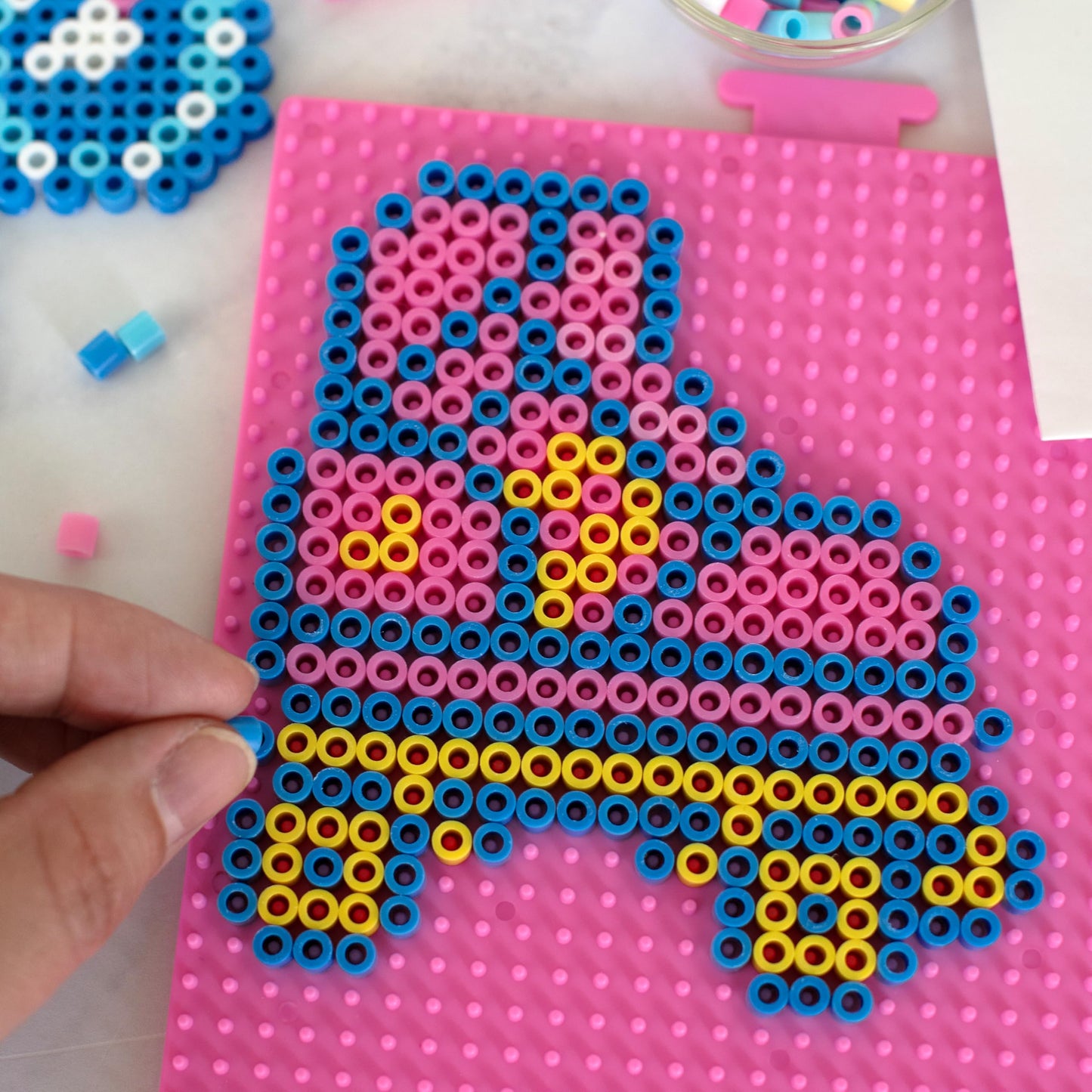 Create iconic Barbie designs with this deluxe fuse bead activity kit from Perler