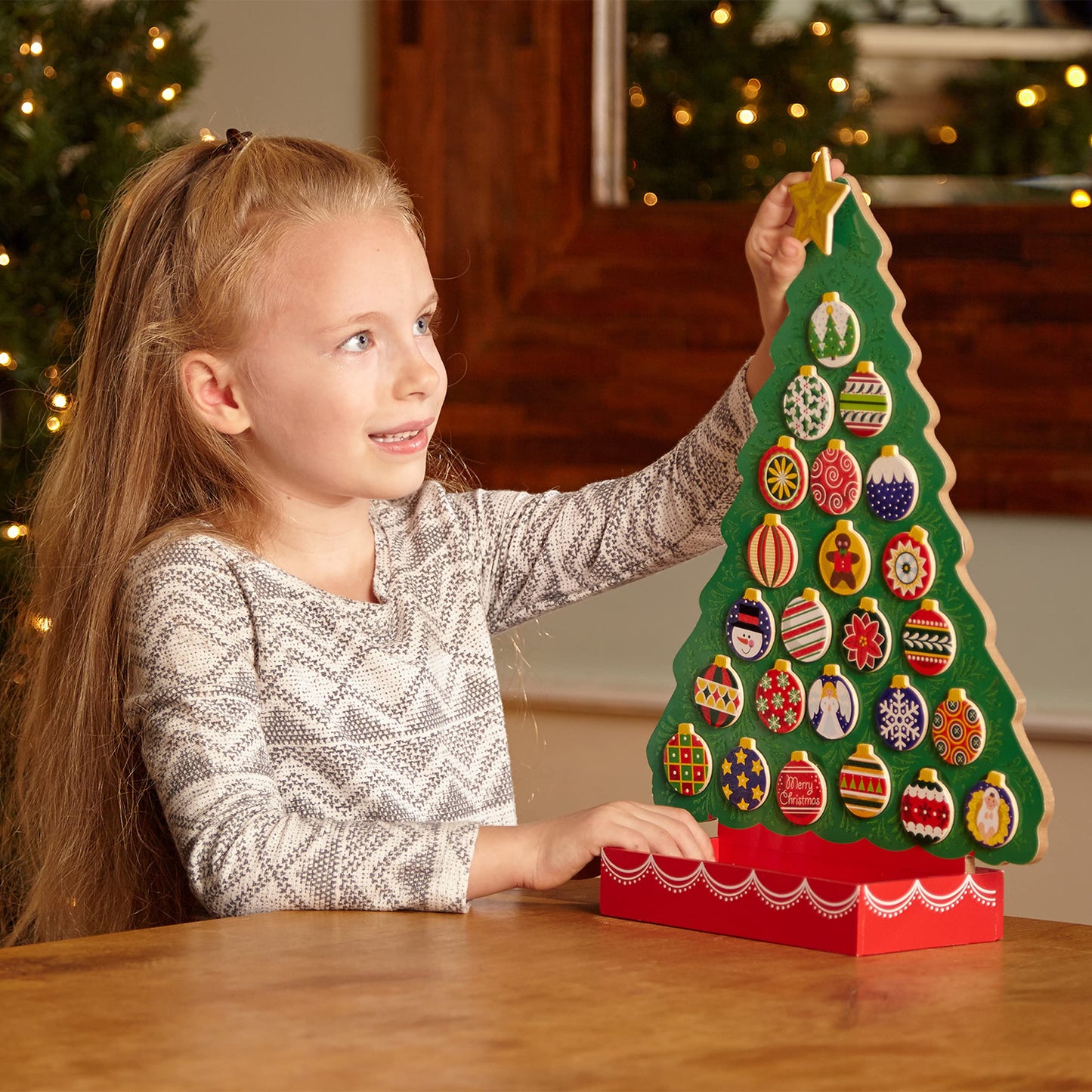 Enhance the holiday spirit in your household with the Melissa & Doug Wooden Advent Calendar