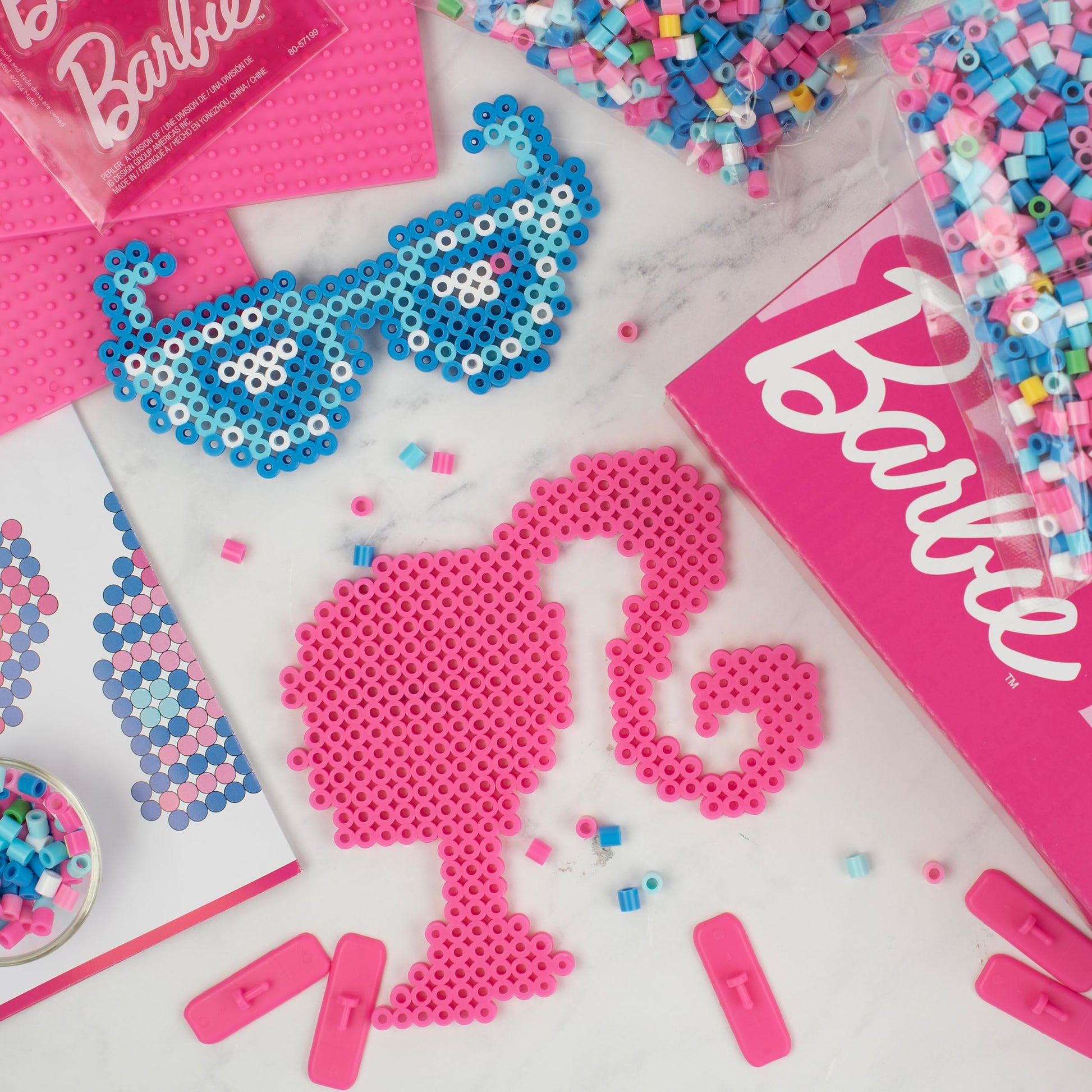 Create iconic Barbie designs with this deluxe fuse bead activity kit from Perler