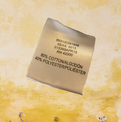 This Wonderkids polka dot long sleeve top is a stylish addition to any toddler's wardrobe