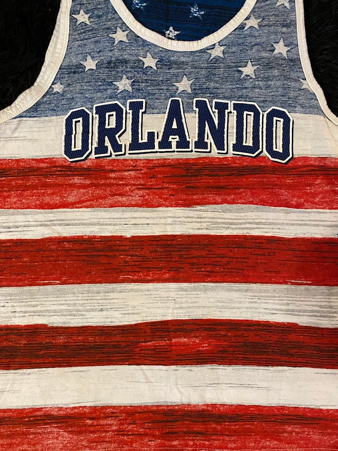 Show off your American pride all summer long with this high-quality stars and stripes tank top