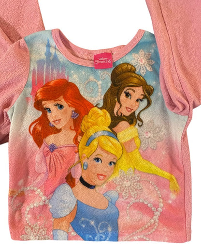 This delightful 2-piece Disney Princess pajama set is perfect for your little girl’s cozy nights