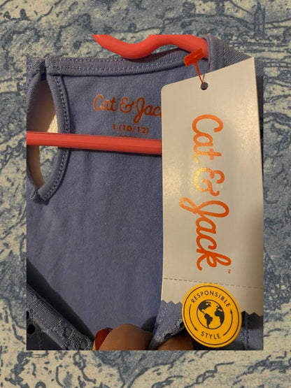 Sleeveless yoke tank top fitted on top and flowy on the bottom