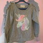 Featuring an adorable unicorn applique and sparkling sequins, this sweatshirt is perfect for girls who want to add some magic to their wardrobe