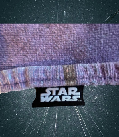 Star Wars Hooded Bath Towel is designed with a striking multicolored pattern