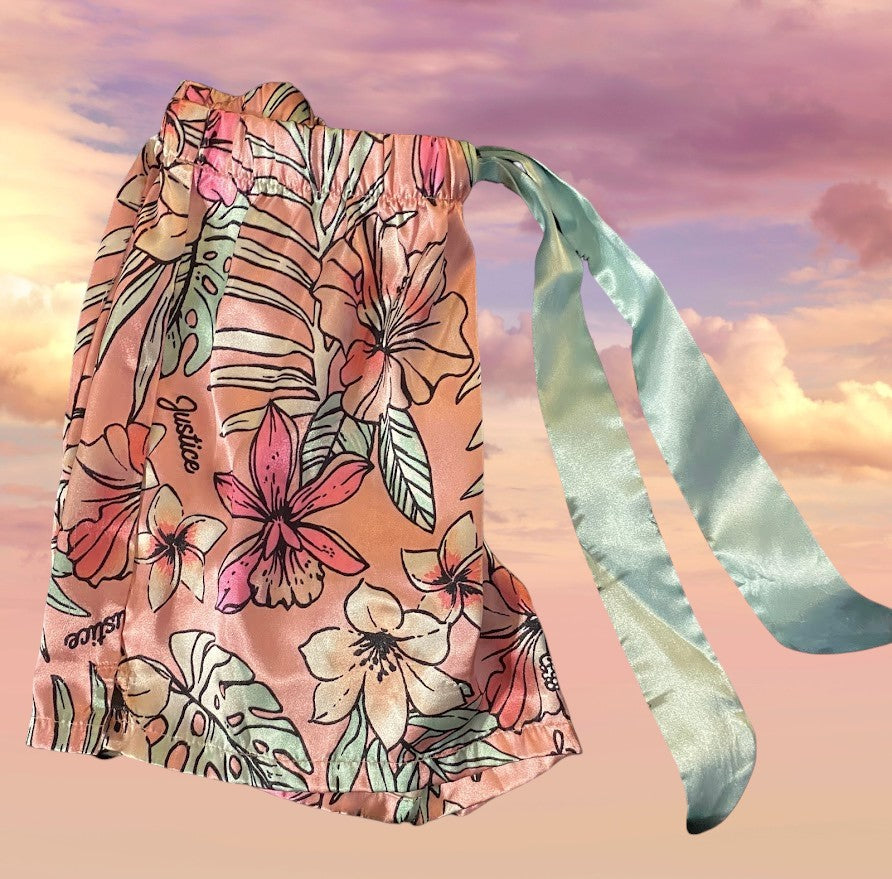 Get cozy while lounging around the house with these adorable floral sleep shorts from Justice