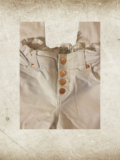 Boost your little one's style and comfort with our Cat & Jack White skinny jeans