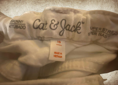 Boost your little one's style and comfort with our Cat & Jack White skinny jeans