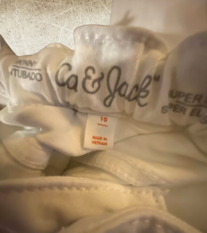 Boost your little one's style and comfort with our Cat & Jack White skinny jeans